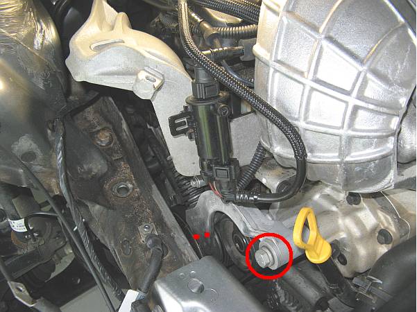  of the tensioner and the supercharger bolt is used as a fulcrum point